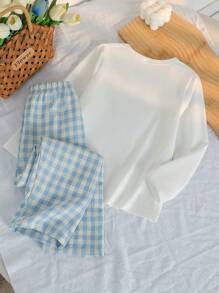 SHEIN Genkimix Kids 2 件套女孩卡通小狗与蝴蝶结印花针织长袖上衣和长裤睡衣套装