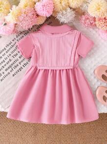 Vestido-camisa de punto rosa de moda para niña bebé (manga corta), verano