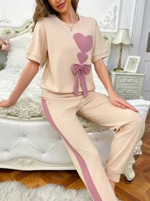 Conjuntos de pijama de mujer de manga corta con lazo, bordado de corazón y color contrastante de corte holgado
