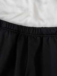 SHEIN Quần short dáng rộng phối đen trắng tương phản dành cho nữ tuổi teen, kiểu dáng đường phố đa năng, thích hợp mặc hàng ngày, mùa xuân/hè, mùa tựu trường, mùa hè. - Đen và trắng - Xem 5