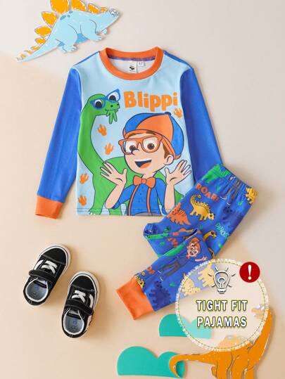 Blippi X SHEIN Conjunto de pijama informal de 2 piezas con ajuste cómodo para niño pequeño, estampado de dinosaurio de dibujos animados - Parte superior con estampado de dinosaurio de dibujos animados azul y pantalón largo con estampado de dinosaurio