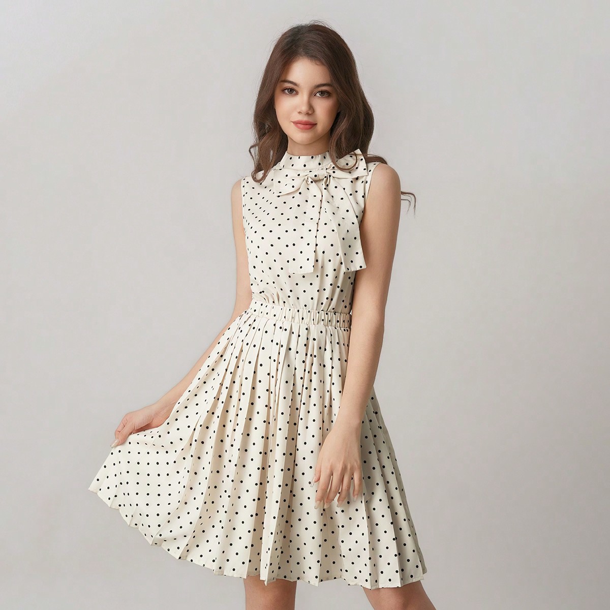 Set de 2 piezas para niñas adolescentes: Parte superior sin mangas con lunares y moño + Falda línea A con estampado de lunares, elegante conjunto d
