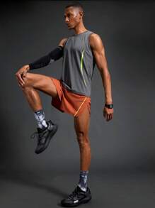 Manfinity Sport Polished Shorts esportivos com fenda lateral e cós em bloco de cores masculino