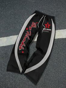 Manfinity EMRG Men's Black Y2K Sweatpants With Reflective Stripes And Graphic Print - Black - View 1