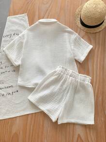 Set de 2 piezas de camisa informal tejida lisa y shorts para niña joven