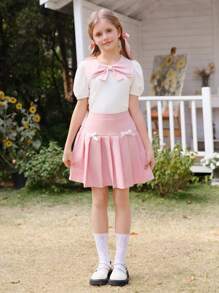 Wildeya Tween-Mädchen 2-teiliges Set, weiße Bluse mit Rüschen, Puffärmeln, Schleifenkragen und rosa Minirock mit Falten, Frühling/Sommer