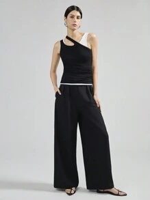 Ontre Canotta donna stile a strati con stampa vintage di valuta, maglia elastica asimmetrica sulla spalla, top a canotta lavorato a maglia in stile urbano moderno monocromatico a strati, senza maniche - Bianco e nero - Visualizzare 2