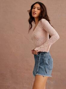 WESTFADE Short mini de mezclilla con cintura anudada y dobladillo deshilachado, corte elástico tipo envolvente para estilo cowgirl