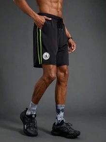 Manfinity Sport Corelite Men's Solid Color Patchwork Lace-Up Pocket Simple Casual Sports Shorts