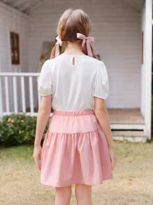 Wildeya Tween-Mädchen 2-teiliges Set, weiße Bluse mit Rüschen, Puffärmeln, Schleifenkragen und rosa Minirock mit Falten, Frühling/Sommer
