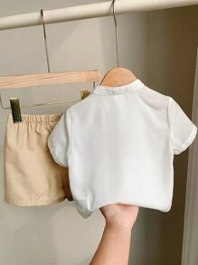 SHEIN Leap Crew 2pcs Toddler Baby Boy/Girl Casual Folk Pattern Print Linen Comfortable Short Sleeve Stand Collar Shirt & Shorts Set Suit For Outing, Holiday, School, Home, Spring/Summer - Khaki - View 2