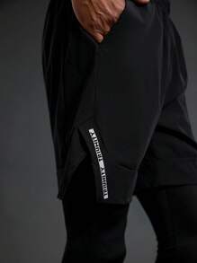 Manfinity Sport Polished بناطيل رياضية كاجوال للرجال ذات خصر مطاطي وجيوب، لون أحادي