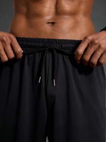 Manfinity Sport Corelite Men's Solid Color Patchwork Lace-Up Pocket Simple Casual Sports Shorts