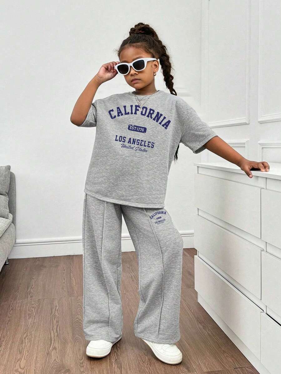 1 套年轻女孩休闲圆领落肩短袖 T 恤和简约条纹宽松裤，日常穿着 - 淺灰色 - 查看 1