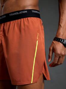 Manfinity Sport Polished Shorts esportivos com fenda lateral e cós em bloco de cores masculino