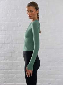 Musera Sport 长袖修身拇指孔运动上衣，饰有品牌标志，适合板式网球、网球、匹克球、健身房、秋季瑜伽、普拉提、日常休闲穿着。