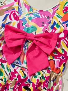 SHEIN Tween Girls Casual Vacation Hollow Back Contrast Color Big Bow Cap Sleeve Ditsy Floral Cinched Waist Romper