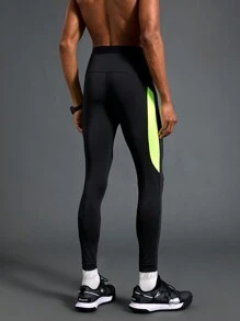 Manfinity Sport Polished Leggings casuales de ajuste slim con parche de unicolor para hombre