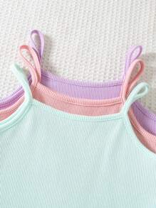 年轻女孩休闲纯色吊带背心