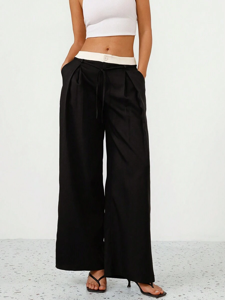Femmeiva Pantalon ample décontracté à jambes larges et longueur extra-longue, avec plis et nœud à la taille. Design simple et élégant en couleur contrastée, polyvalent pour les déplacements - Noir - Voir 1