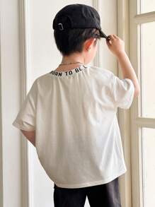 SHEIN 1 chiếc áo thun họa tiết chữ Unisex cỡ lớn thoải mái cho trẻ em, thiết kế đơn giản đa năng thích hợp cho mùa xuân/hè, trang phục thường ngày, thể thao, đi chơi, đi học, tụ tập, ngày lễ, chụp ảnh, mùa tựu trường - trắng - Xem 2
