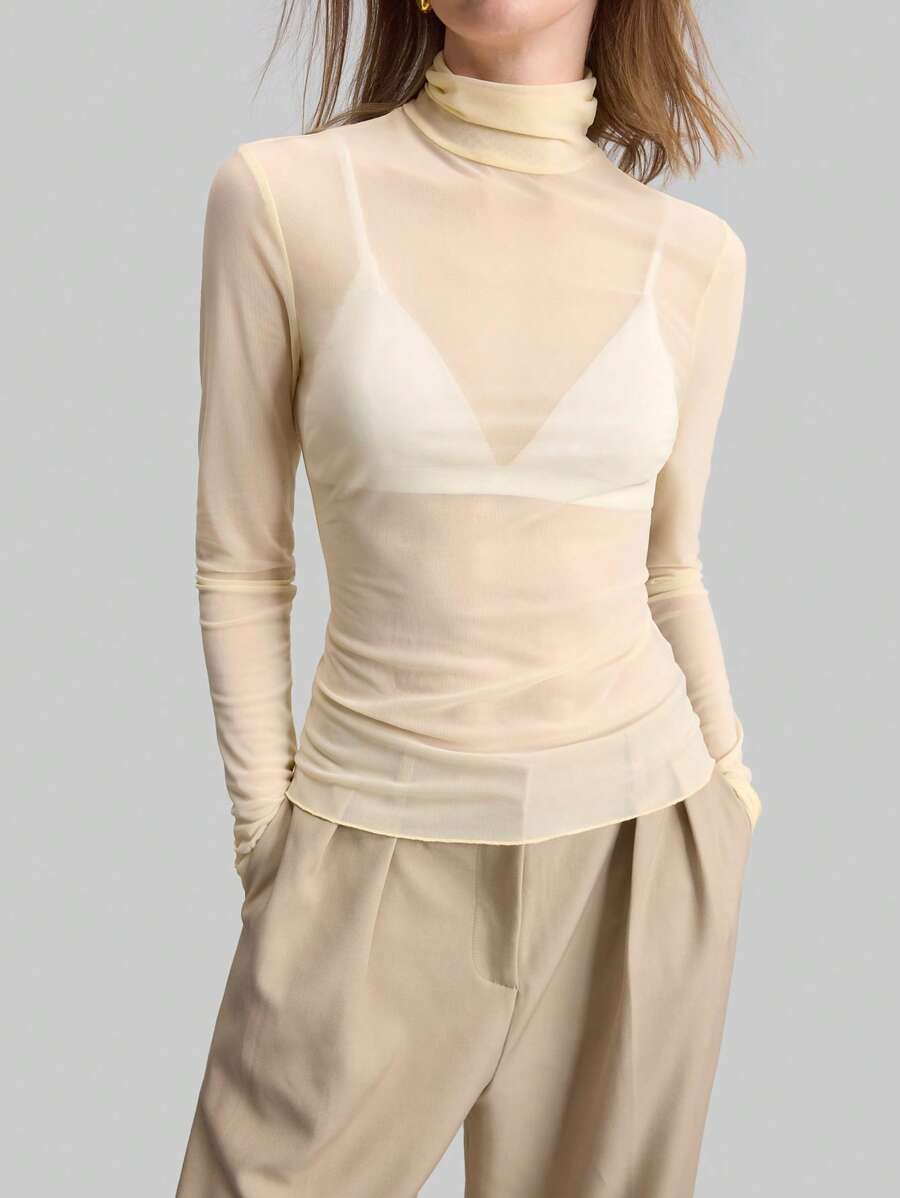 Ontre Bộ sưu tập thời trang nữ mùa Xuân/Hè 2026 phong cách Stockholm, trang phục giáo viên nữ, quần áo nữ, áo len cổ lọ màu be, áo kiểu mùa hè thanh lịch, áo sơ mi dài tay lưới, áo cơ bản công sở thường ngày dành cho nữ. - Màu be - Xem 1