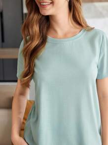 CoupledUp Conjunto de pijama con top de unicolor de cuello redondo y manga corta y pantalón a cuadros para mujer