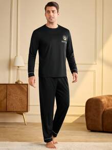 Manfinity Underwear&Sleepwear Basics Set de pijama de 2 piezas con pantalón y top de manga larga de cuello redondo estampado, estilo minimalista para hombre