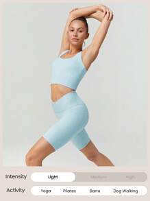 GLOWMODE Parte superior deportiva tipo tanque FeatherFit™ con espalda retorcida, de bajo impacto, para yoga y uso diario