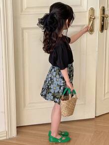 DAZY Set de 2 piezas con blusa de cuello redondo de manga corta y minifalda lisa para niñas, conjunto de ropa de verano para niñas - Negro - Ver 2
