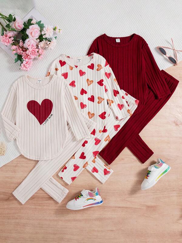 SHEIN Set de 3 piezas para niñas jóvenes de otoño/invierno: jersey de cuello redondo de manga larga con estampado de corazón, leggings con gráfico de corazón, conjunto de ropa de estar por casa informal de color liso