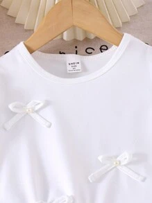 SHEIN Young Girl Knitted Short Sleeve Puff Sleeve Top With Pearl Bow Design, Fashion T-Shirt, Denim Shorts, White Mesh Floral Trim, Stylish Summer Outfit