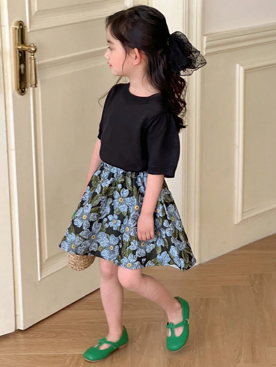 DAZY Set de 2 piezas con blusa de cuello redondo de manga corta y minifalda lisa para niñas, conjunto de ropa de verano para niñas - Negro - Ver 1