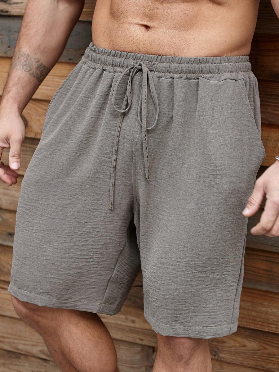 Manfinity Homme Plus Size Men's Solid Color Front Tie Pocket Casual Shorts