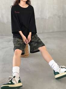 FRIFUL 女士黑色宽松T恤，装饰缝线和字母印花，短袖，休闲夏装超大T恤 - 黑色 - 查看 2