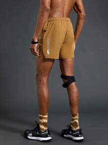 Manfinity Sport Polished Shorts deportivos casuales con bolsillo y diseño con lazo delantero impresos para hombres, de diseño simple