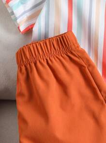SHEIN Conjunto de 2 piezas con top de manga corta a rayas y shorts de color liso para niño pequeño - Multicolor - Ver 6