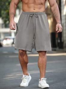 Manfinity Homme Plus Size Men's Solid Color Front Tie Pocket Casual Shorts