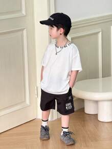 SHEIN 1 chiếc áo thun họa tiết chữ Unisex cỡ lớn thoải mái cho trẻ em, thiết kế đơn giản đa năng thích hợp cho mùa xuân/hè, trang phục thường ngày, thể thao, đi chơi, đi học, tụ tập, ngày lễ, chụp ảnh, mùa tựu trường - trắng - Xem 7