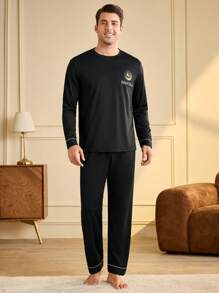 Manfinity Underwear&Sleepwear Basics Set de pijama de 2 piezas con pantalón y top de manga larga de cuello redondo estampado, estilo minimalista para hombre
