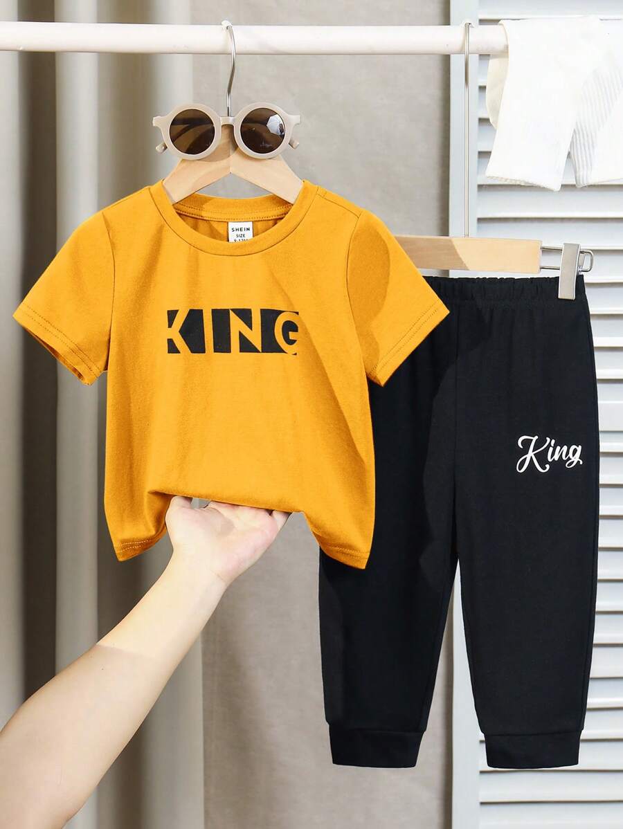 SHEIN 2 件套男婴和女婴夏季时尚可爱字母印花短袖上衣和松紧腰裤套装,适合日常穿着、上学、旅行和运动,春夏 - 彩色 - 查看 1