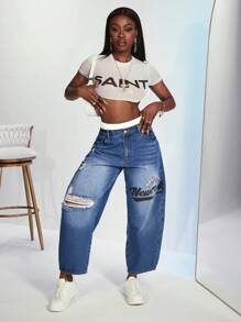 Slaydiva Dwukolorowe jeansy z nadrukiem w paski i dziurami w kształcie banana - Wielokolorowe - Zobacz 5