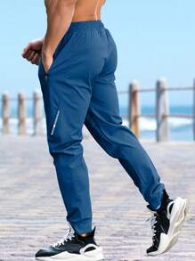 Gym Rark Men's Solid Color Drawstring Waist Jogger Pants Fall Breathable Sweat Pants - Blue - View 2