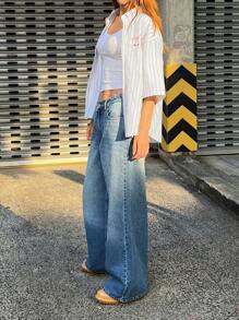 EURMUSE WOMEN BACK DETAIL FRINGE POCKET LOW WAIST EXTRA WIDE LEG JEANS - Medium Wash - View 1