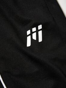 Manfinity Sport Corelite Men's Line Patchwork Front Tie Waist Simple Casual Sports Sweatpants