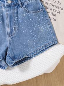 SHEIN Pantaloncini di jeans casual per ragazze pre-adolescenti con tasche strappate e dettagli di strass