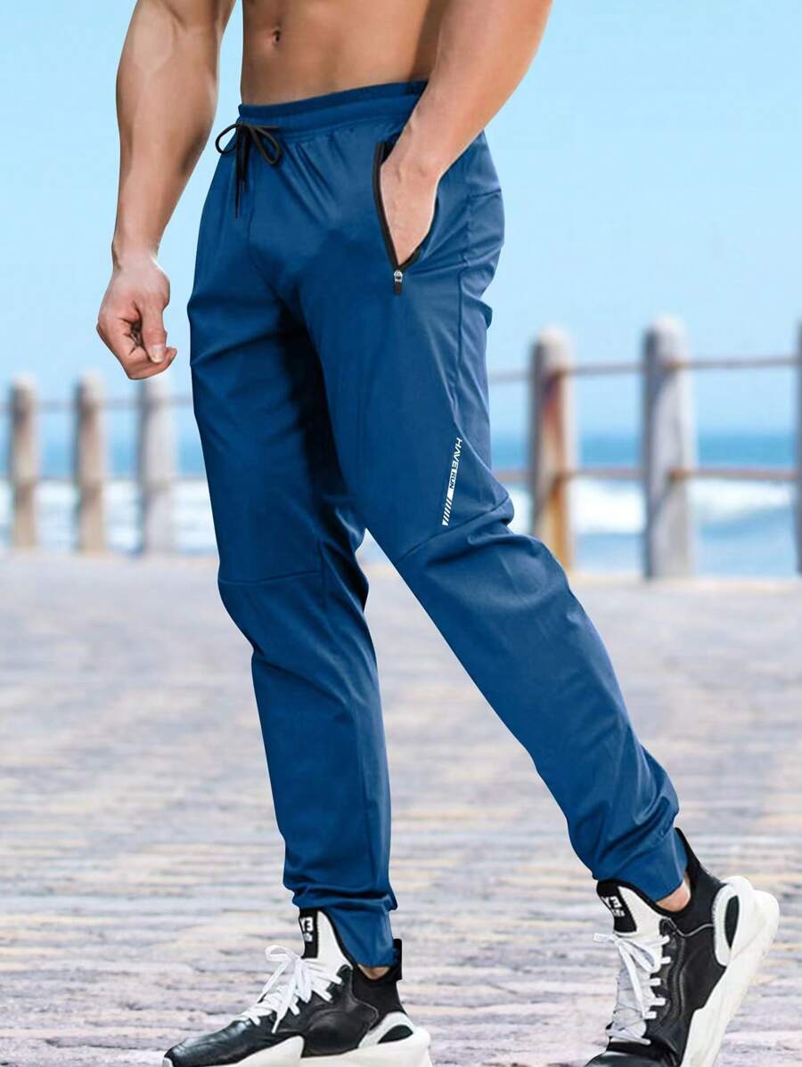 Gym Rark Men's Solid Color Drawstring Waist Jogger Pants Fall Breathable Sweat Pants - Blue - View 1
