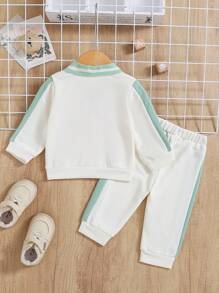 Conjunto de top con cuello polo y pantalones de bloques de color para niño bebé