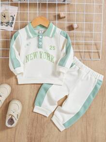 Conjunto de top con cuello polo y pantalones de bloques de color para niño bebé