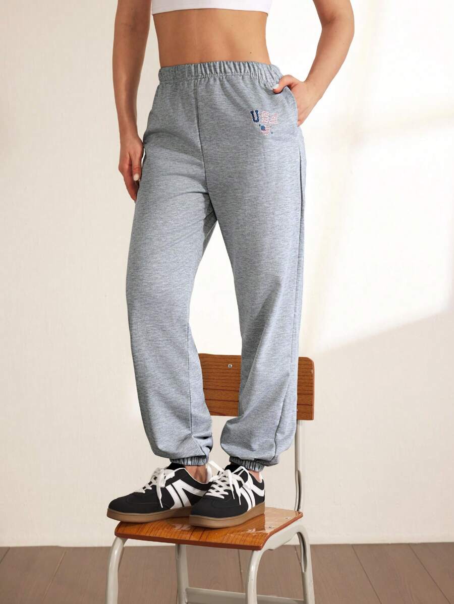 Cheerettes Pantalones de chándal casuales con cintura elástica y bolsillos con estampado de letras para mujeres